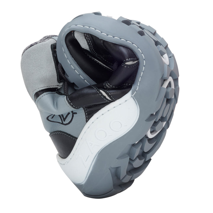 A Q2 Gray Waterproof shoe from ZAQQ, which shows off its incredible flexibility by bending in the middle, features a thick, textured TERRA sole. The gray and black barefoot shoe features visible stitching and branding on the sole, making it ideal for outdoor adventures.