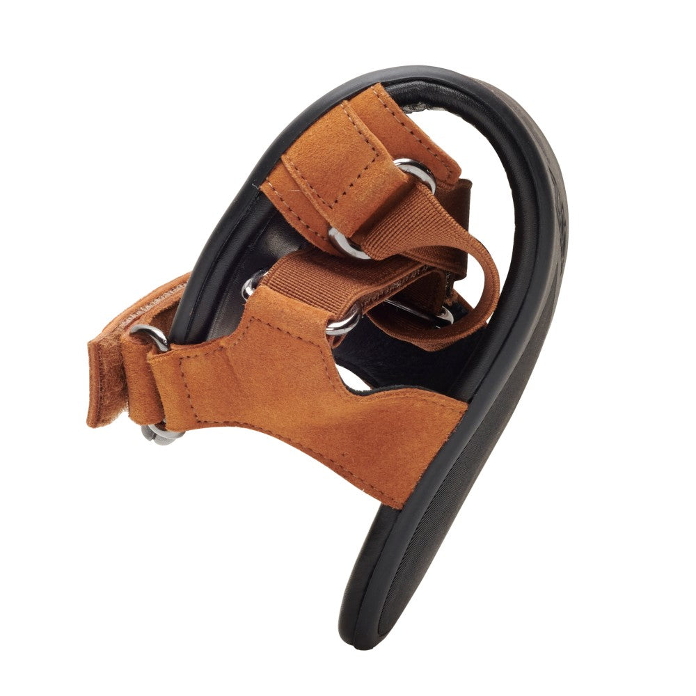 The MIQA Brown dog shoe from ZAQQ is made of high-quality suede and features metal rings and a Velcro strap system so it can bend in the middle and show off its flexibility. It also features a black sole for improved grip and comfort.