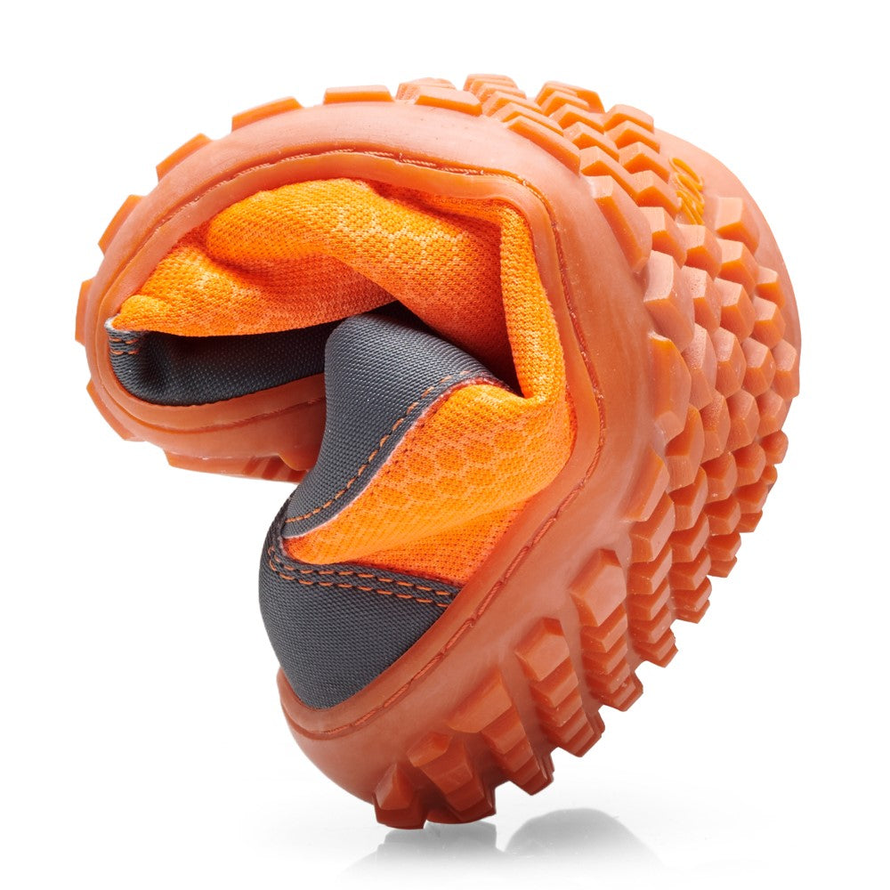 The SQIP Orange Gray running shoe from ZAQQ with a sturdy, textured sole is artfully twisted into a knot to demonstrate its flexibility and is made from vegan material.