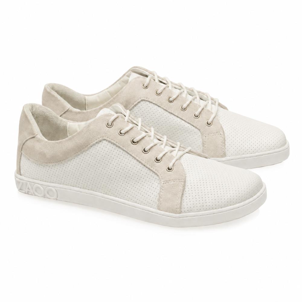 Esitleme ZAQQ QORE Low White Sneakerit: elegantsed valged vabaajajalatsid beežide aktsentide ja valgete paeltega. Need kvaliteetsest nappa-nahast, perforeeritud tekstuuriga tossud on inspireeritud paljajalu jalatsite disainist ja neil on hele tald, mis pakub ületamatut mugavust ja stiili.